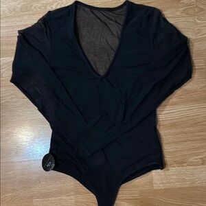 Klassy Network Mesh Deep V Bodysuit in Black